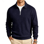 Navy blue textured quarter-zip pullover with polo collar, front view paired with beige trousers