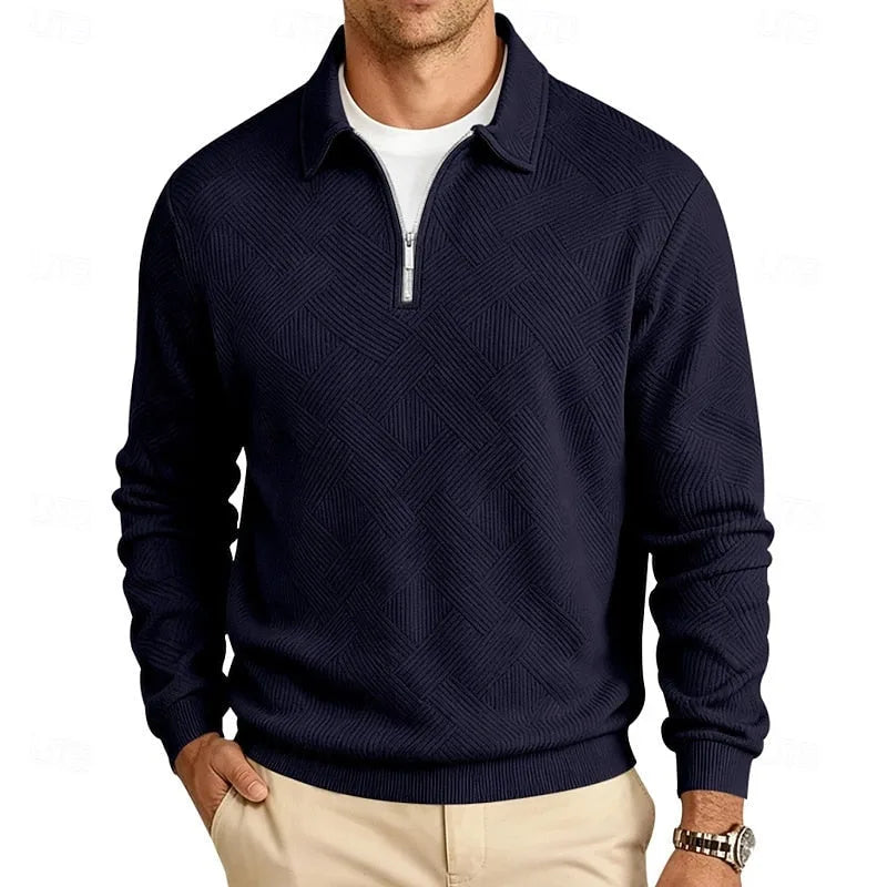 Navy blue textured quarter-zip pullover with polo collar, front view paired with beige trousers