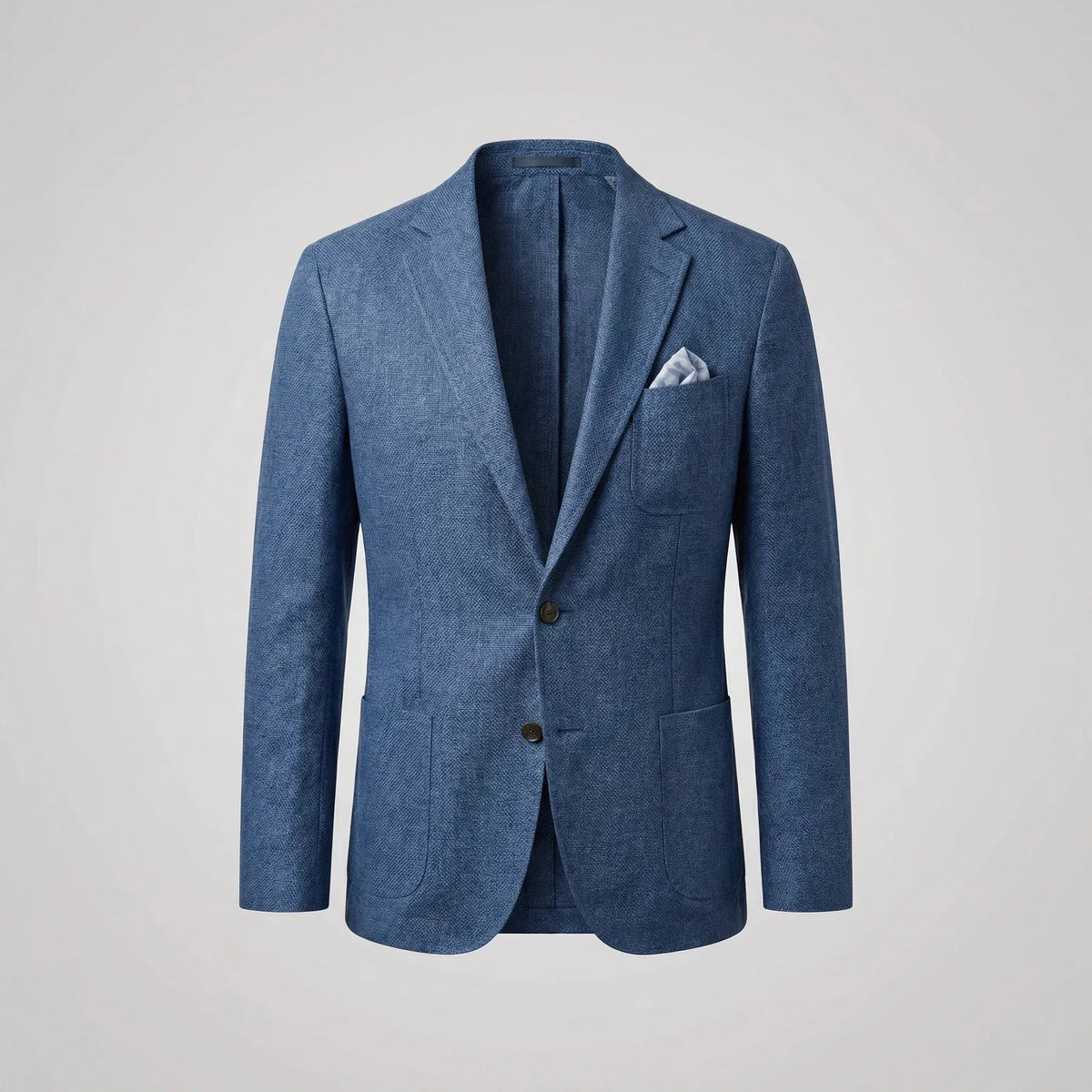 Flat lay front view of the blue textured blazer with a pocket square in the welt pocket