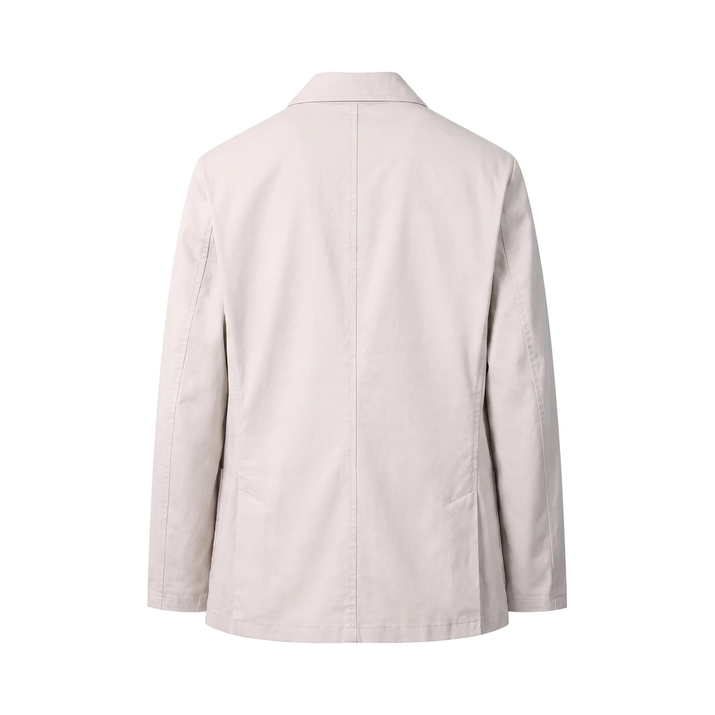 Back view of the beige cotton blazer showing the clean seam detailing and soft shoulder