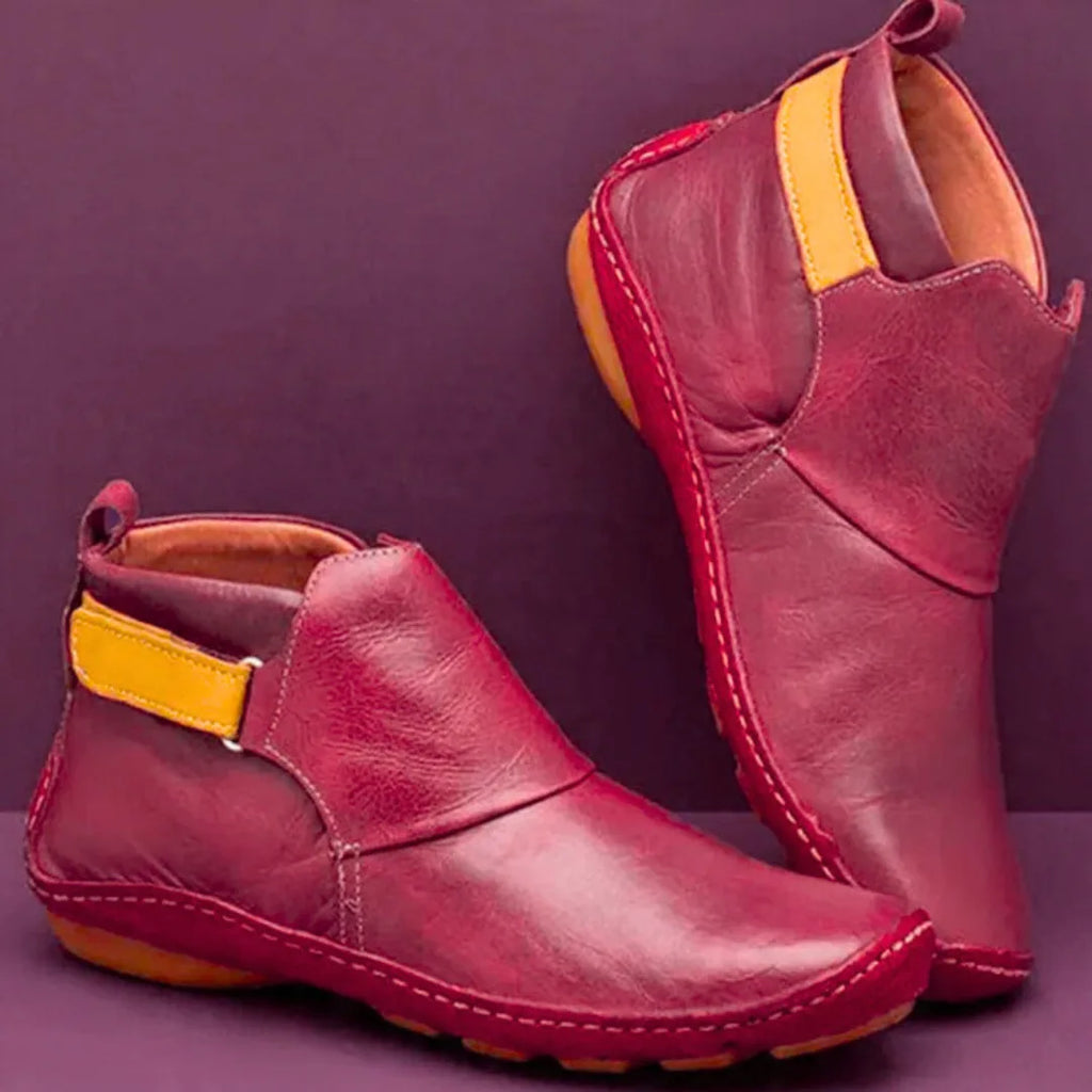 Burgundy leather ankle boots with mustard side tab and hand stitched detailing, front and rear view