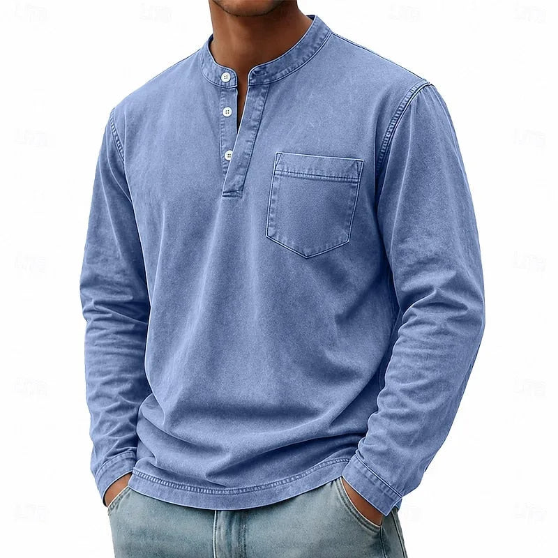 Man wearing the black henley shirt in a relaxed stance showing overall silhouette