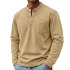 Front angled shot of the purple henley shirt paired with denim trousers