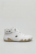 Side view showing the full silhouette with structured toe cap, moc-stitch detailing and tonal laces