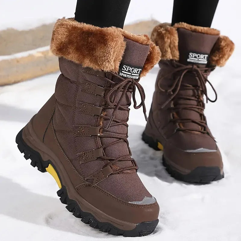 Brown waterproof winter boot with tan faux-fur cuff, lace-up front and yellow-accented sole, shown walking on snow.