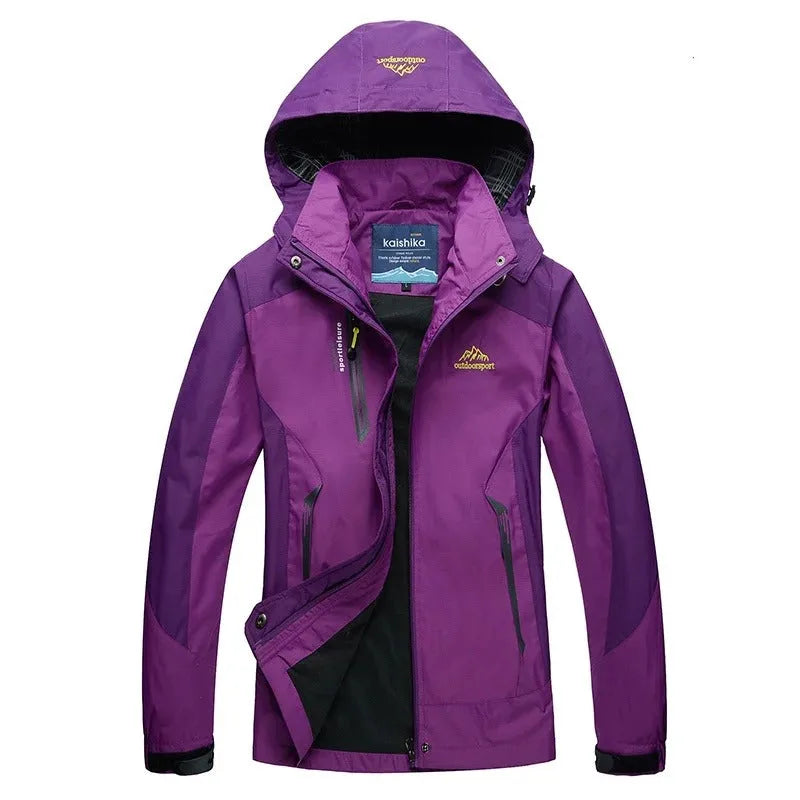Purple two-tone waterproof jacket with hood, front view showing zip pocket and drawstring hem