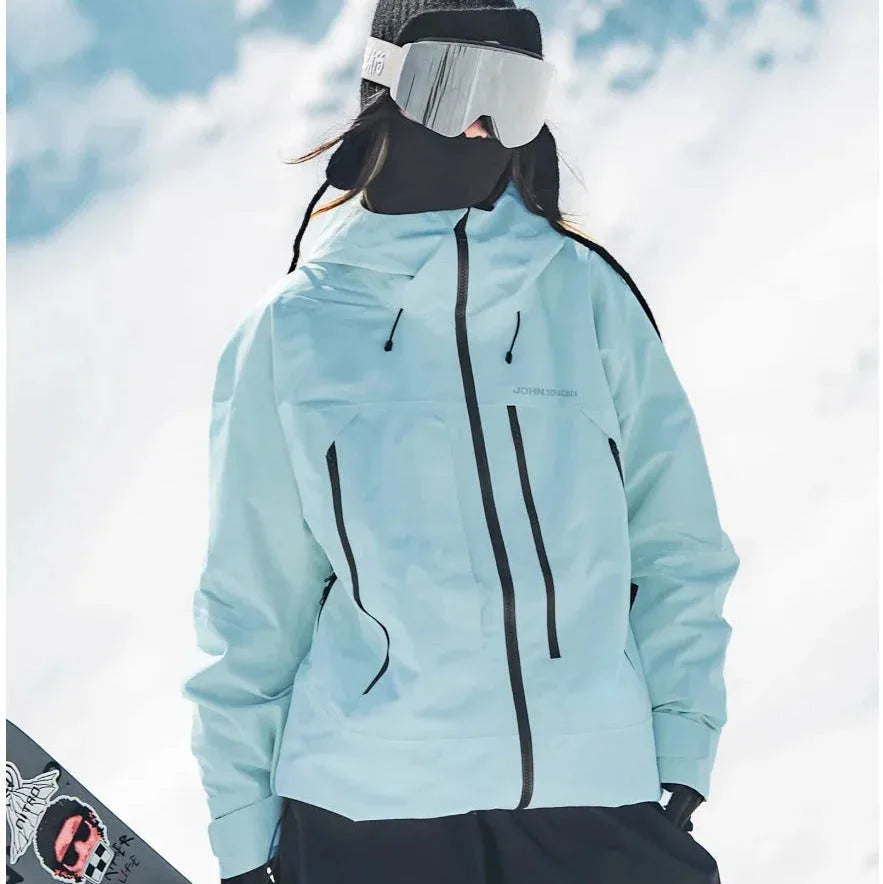 Rear three-quarter view of the pale blue jacket showing the hood drawstrings and relaxed oversized fit