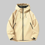Beige hooded jacket, front view, showing relaxed boxy fit, zip pockets and adjustable hood toggles
