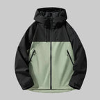 Green and black colour-block hooded jacket, front view, showing two-tone panelling and drawstring hood