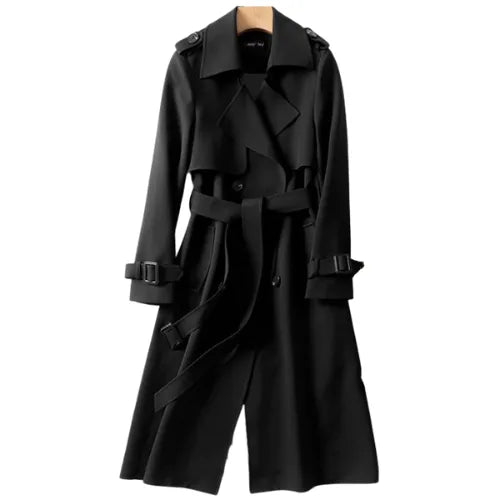 Black belted trench coat with wide lapels and buckled cuffs, front view on a wooden hanger