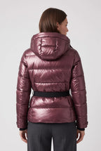 Back view of the metallic burgundy puffer jacket showing the attached hood and belted back panel