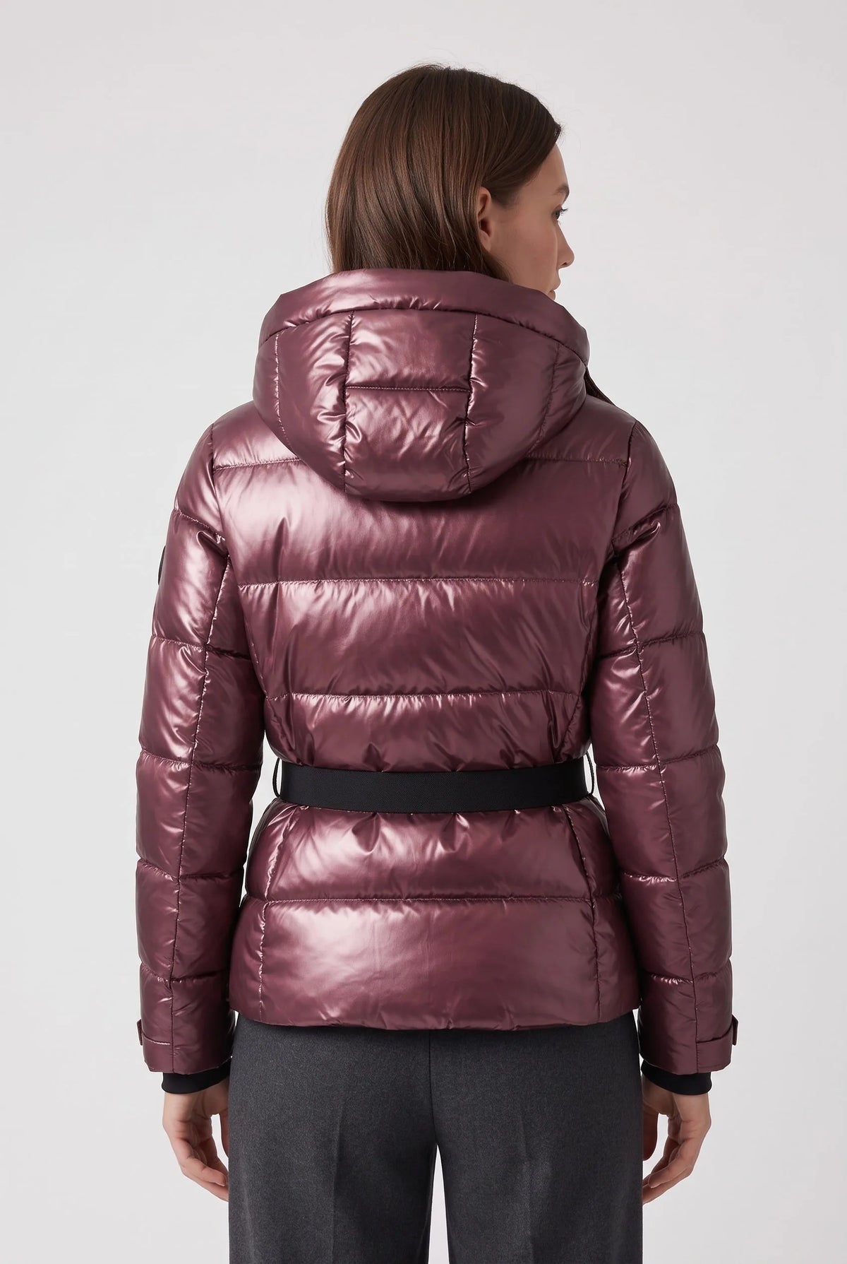 Back view of the metallic burgundy puffer jacket showing the attached hood and belted back panel