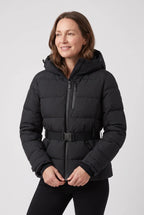 Woman wearing a matte black hooded puffer jacket with contrast zip pulls and belted waist