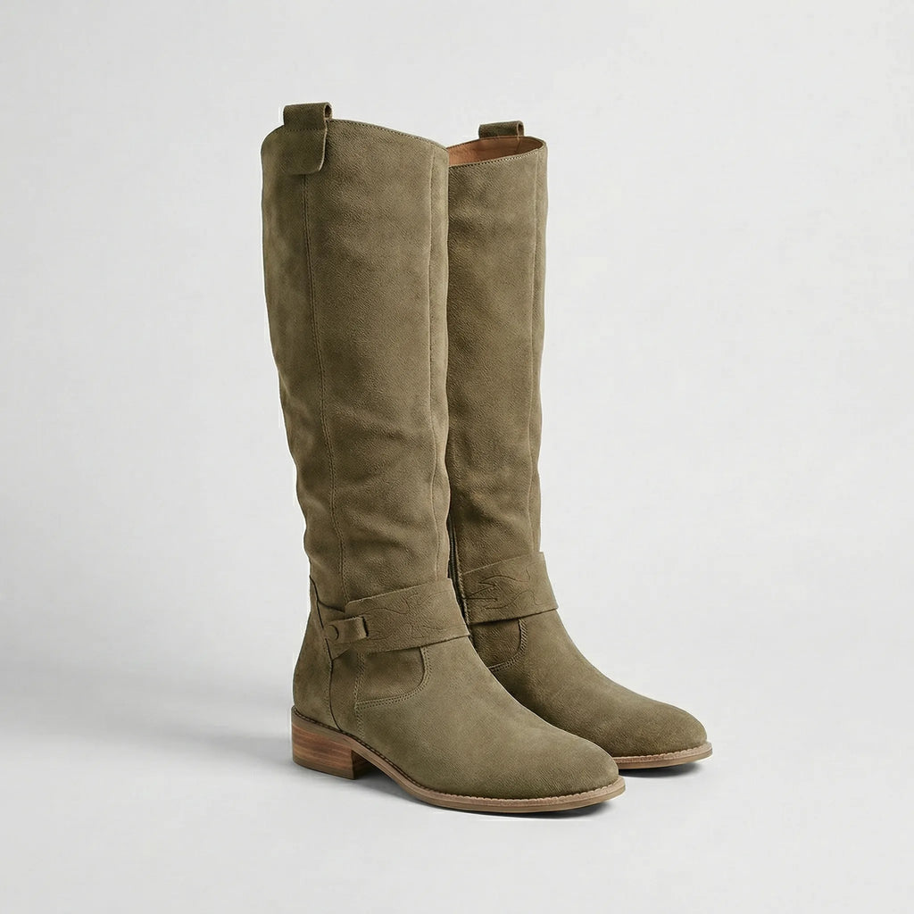 Pair of khaki green suede-look knee-high boots with slouchy shaft and buckle strap detail, side angle