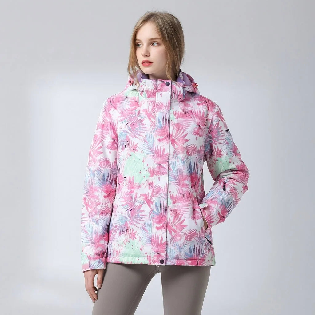 Three-quarter view of the pink floral hooded jacket with the hood down, showing the lilac inner lining