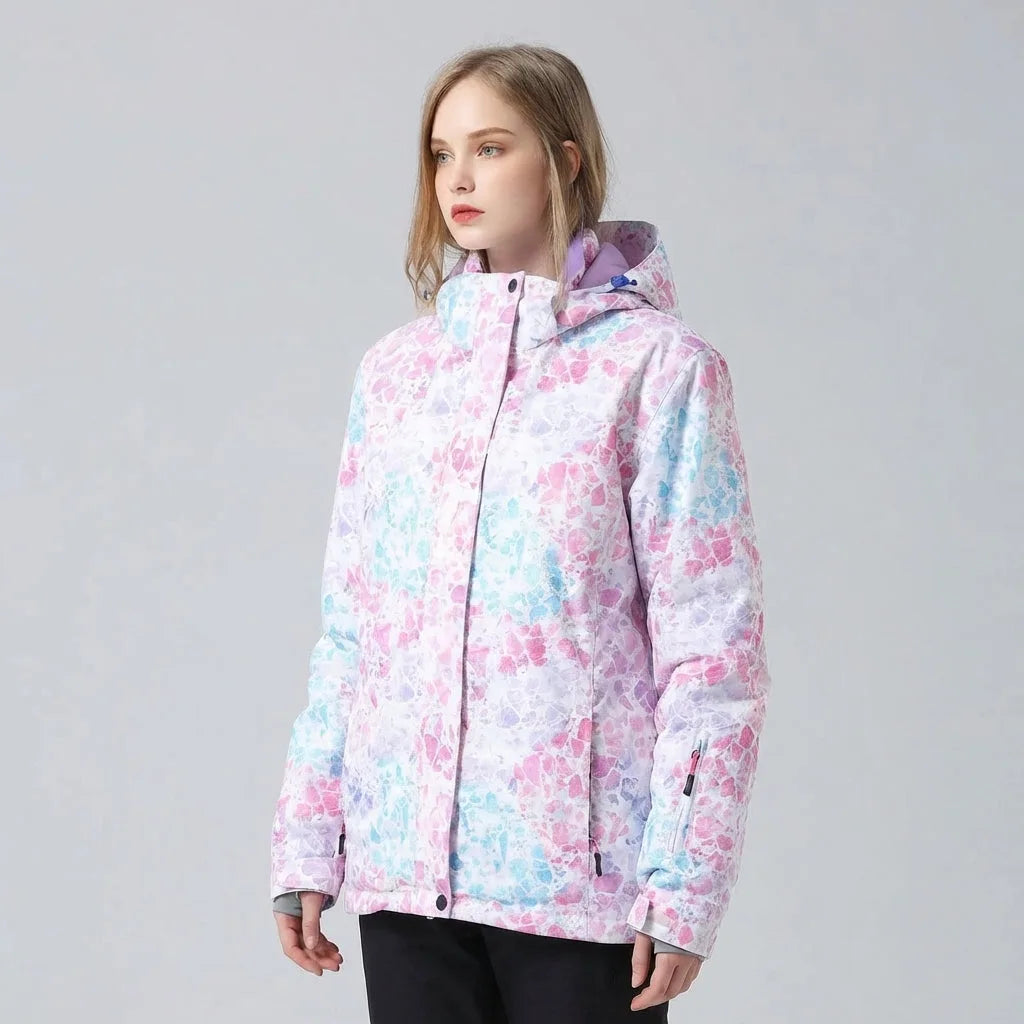 Side angle of a pastel pink, blue and purple crystal print hooded jacket with a zip chest pocket