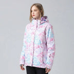 Side angle of a pastel pink, blue and purple crystal print hooded jacket with a zip chest pocket