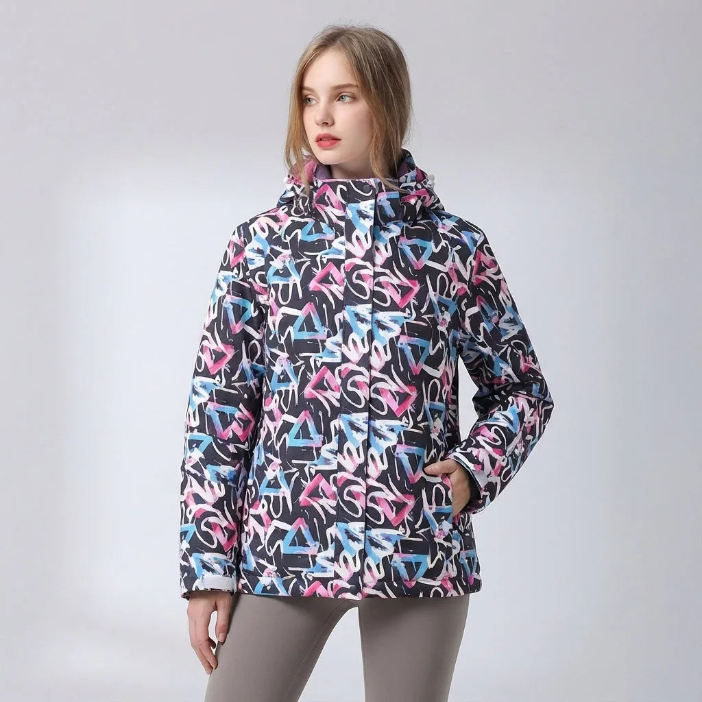 Navy jacket with a bold pink and blue graffiti triangle print, hood up with drawcord toggles