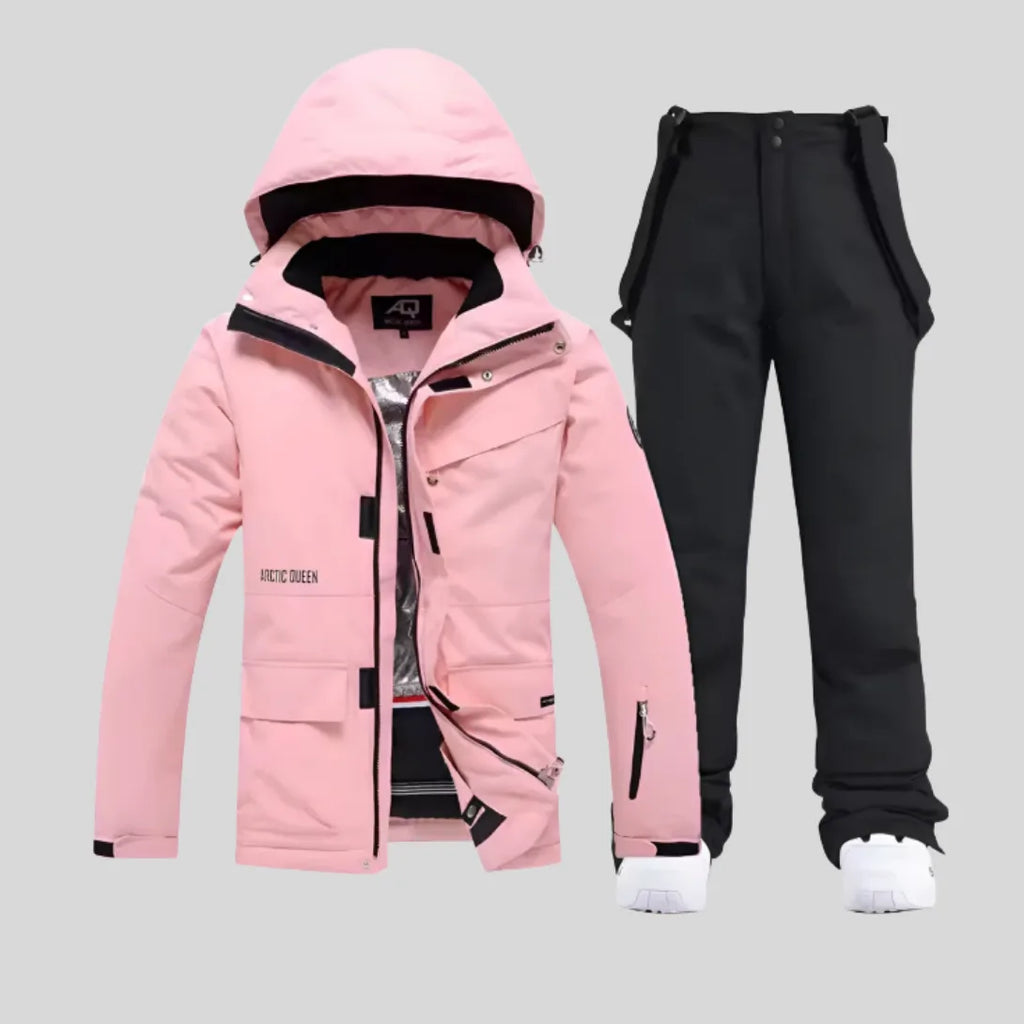 White hooded ski jacket matched with marled grey bib trousers for a two-tone look
