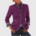 Purple wool-blend blazer with stand collar, grey trim, horn-style buttons and turned-back denim cuffs