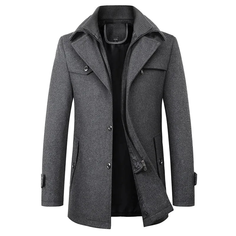Charcoal grey mid-length coat with knitted collar, front zip and button placket, side pockets visible