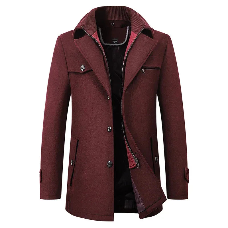 Burgundy wool coat with adjustable cuff tabs and welt side pockets, front view fully buttoned