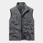 Grey zip gilet with stand collar, four zipped pockets and soft mesh inner lining shown open